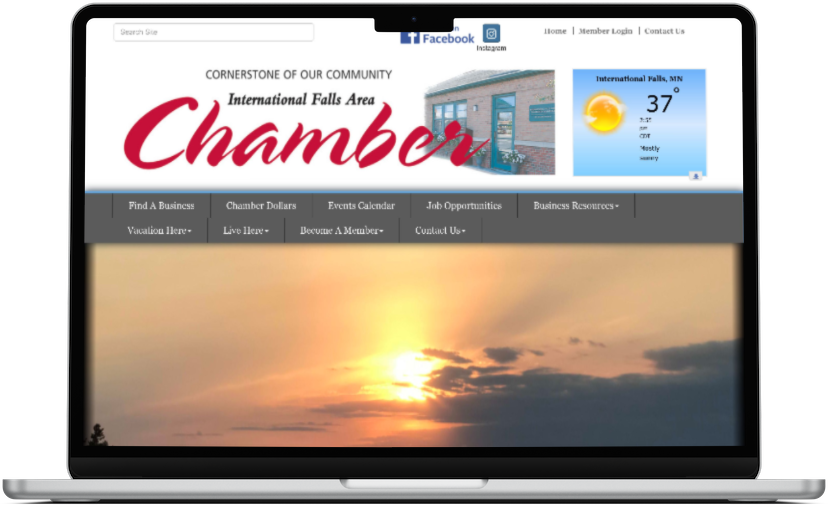 international falls area chamber of commerce website home page as seen on a laptop